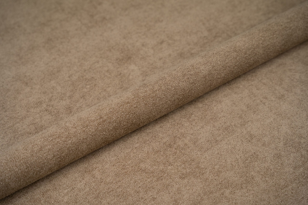 HEVIA er et kraftig og slitesterkt møbelstoff i 100 % polyester, med en flott, strukturert overflate og en slitestyrke på hele 60 000 Martindale.
